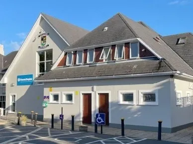 A gallery showing Glenalbyn house, tennis courts and village cafe